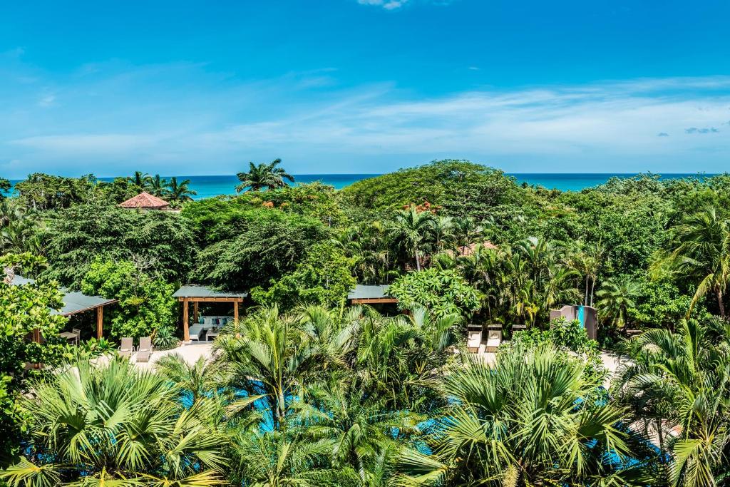 Clique na foto e faça sua reserva no Cala Luna Boutique Hotel & Villas, em Tamarindo, Costa Rica.